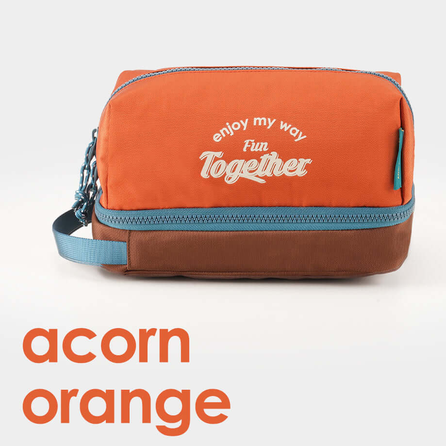 Orange travel toiletry bag perfect for organized trips.