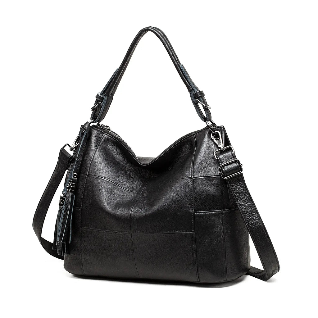 Elegant black leather handbag for women with tassel