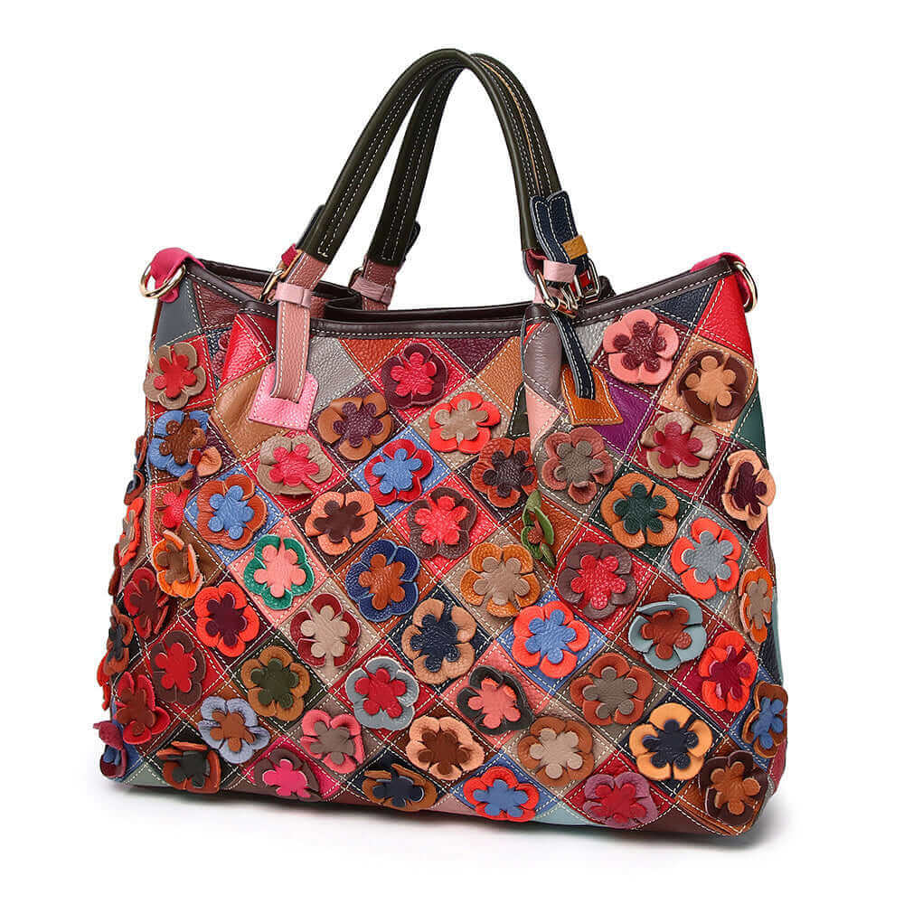 Front view of genuine leather patchwork handbag with colorful floral patterns.