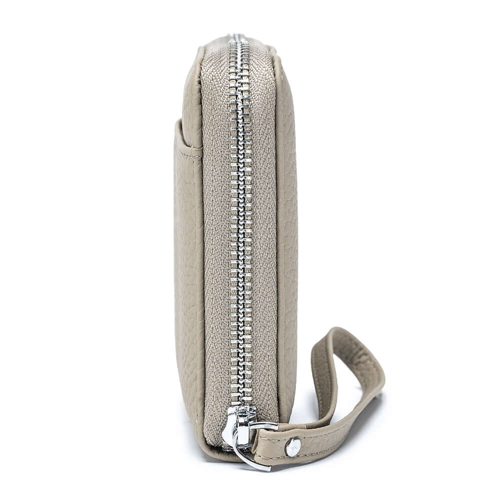 Side view of the grey leather passport case.