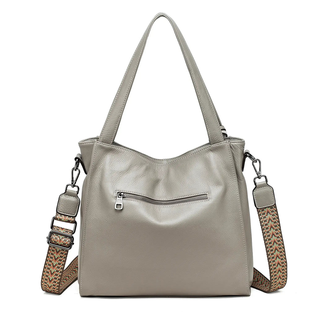 Back profile of structured grey tote with dual handles