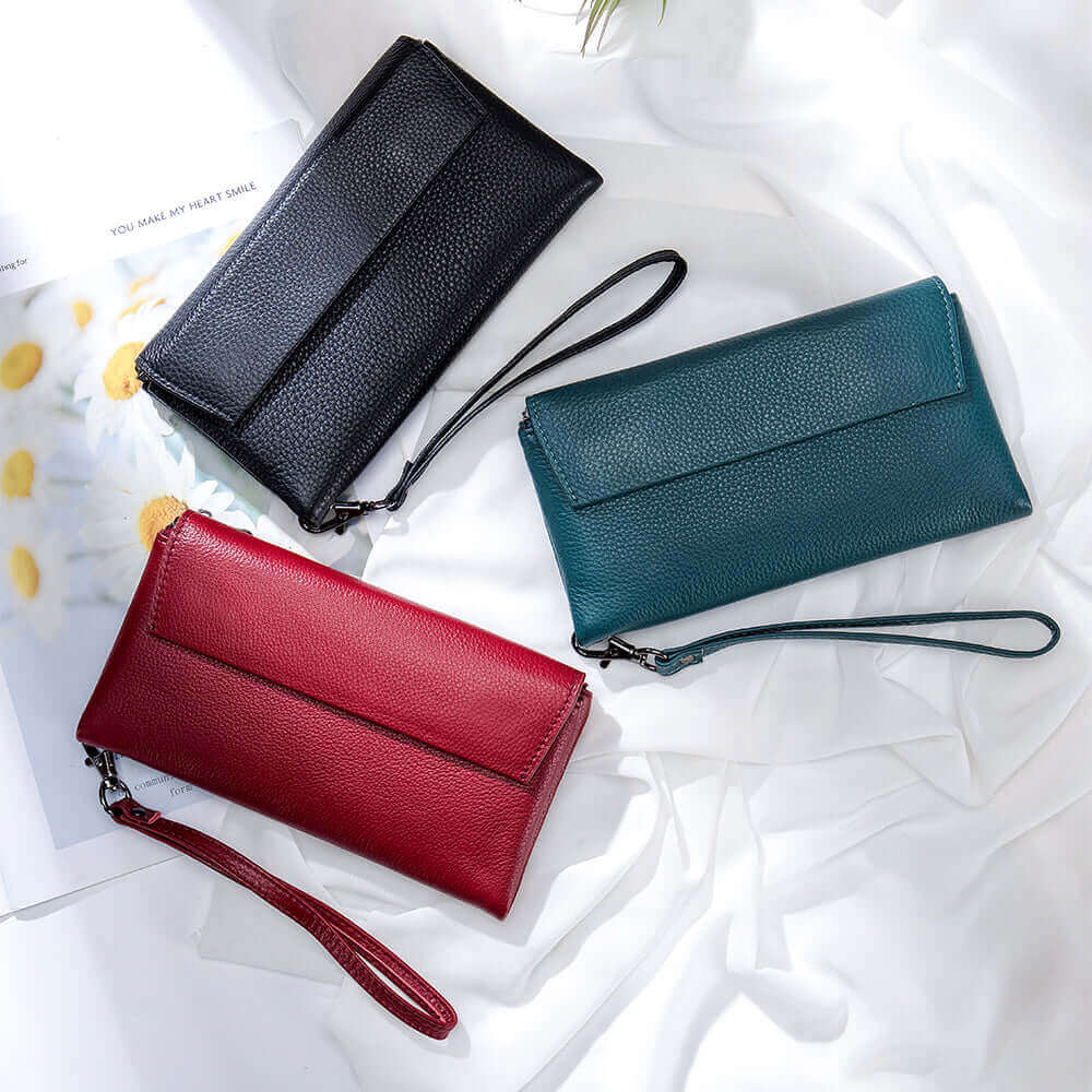 High-quality leather envelope wallet in black, red, and blue.