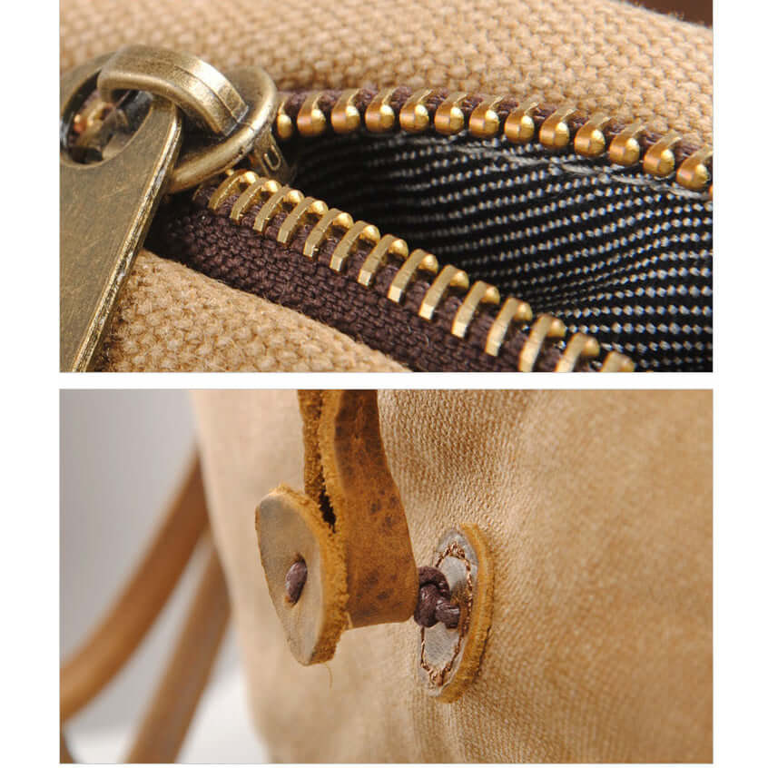 Close-up of a beige bag with zipper and leather patch.