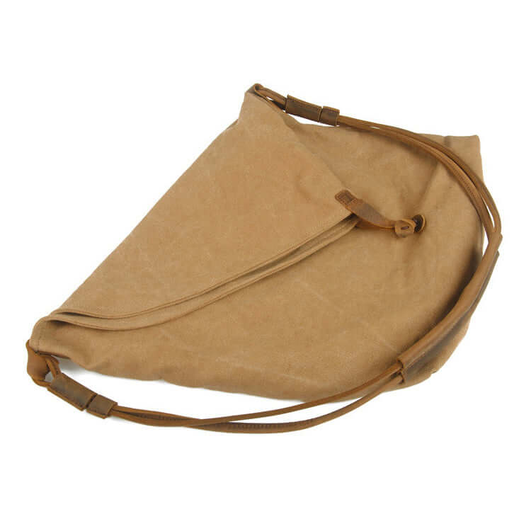 Khaki canvas bag styled as crossbody