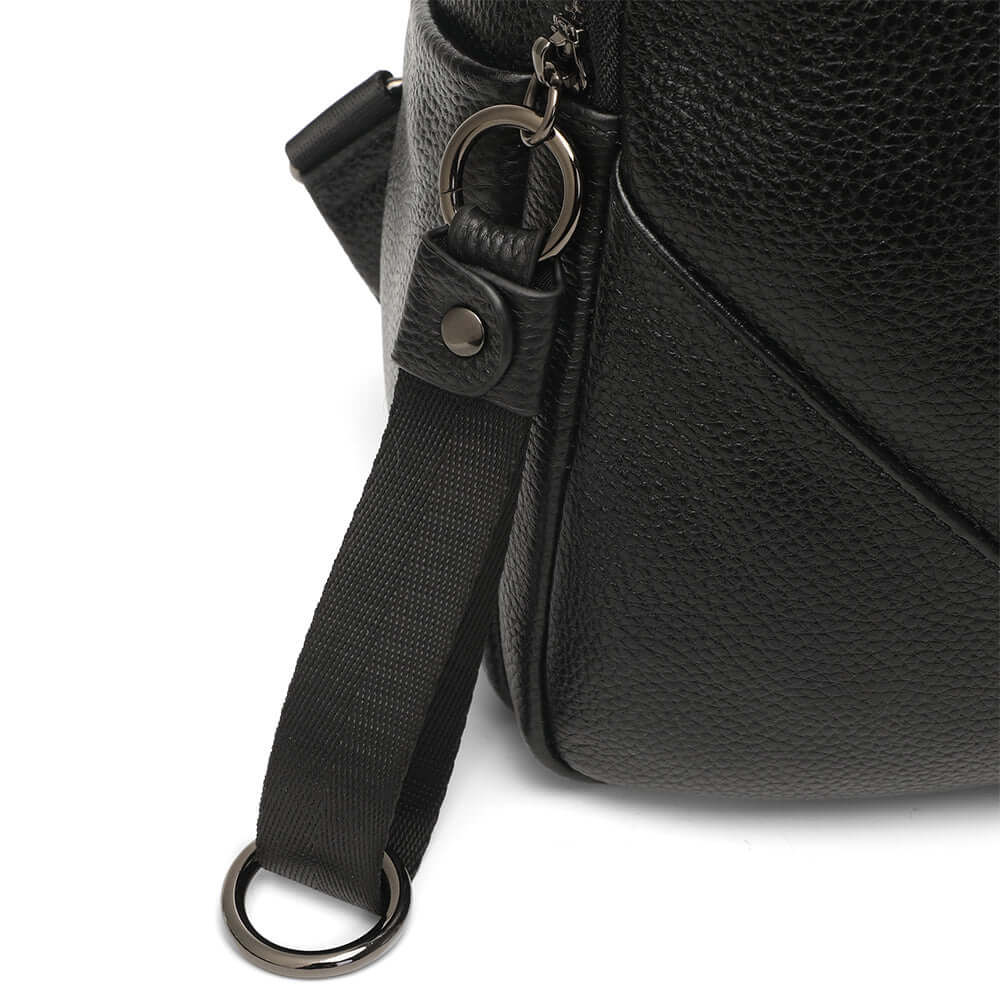 Close up hardware details on leather backpack