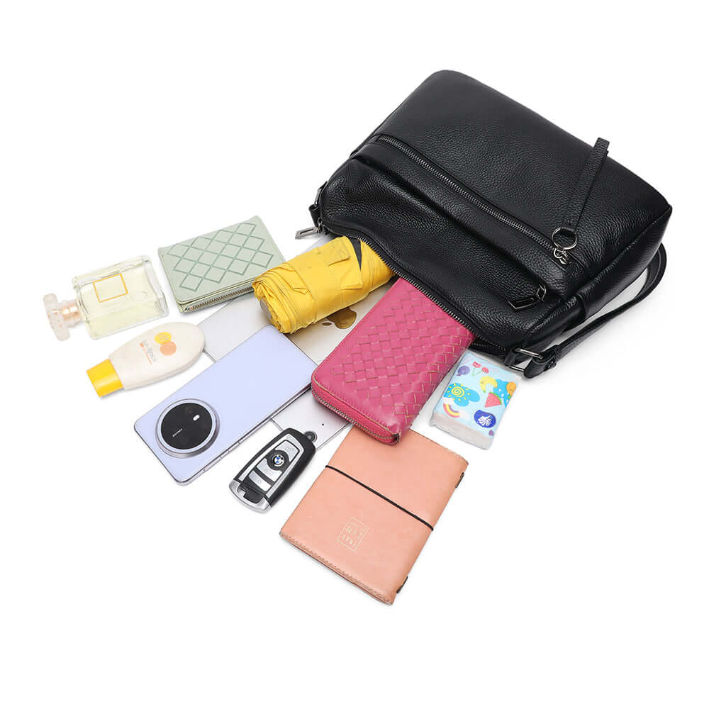 leather shoulder bag showing daily essentials