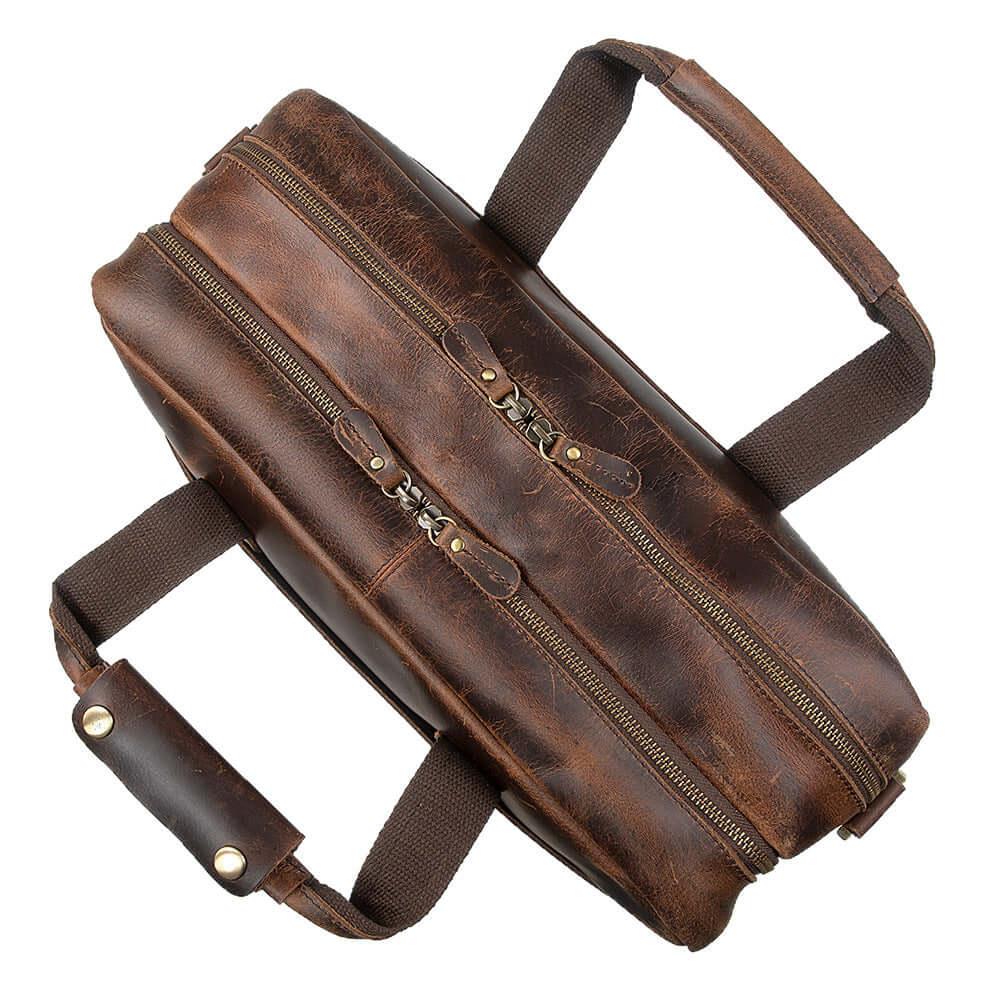 Close-up of top leather handles