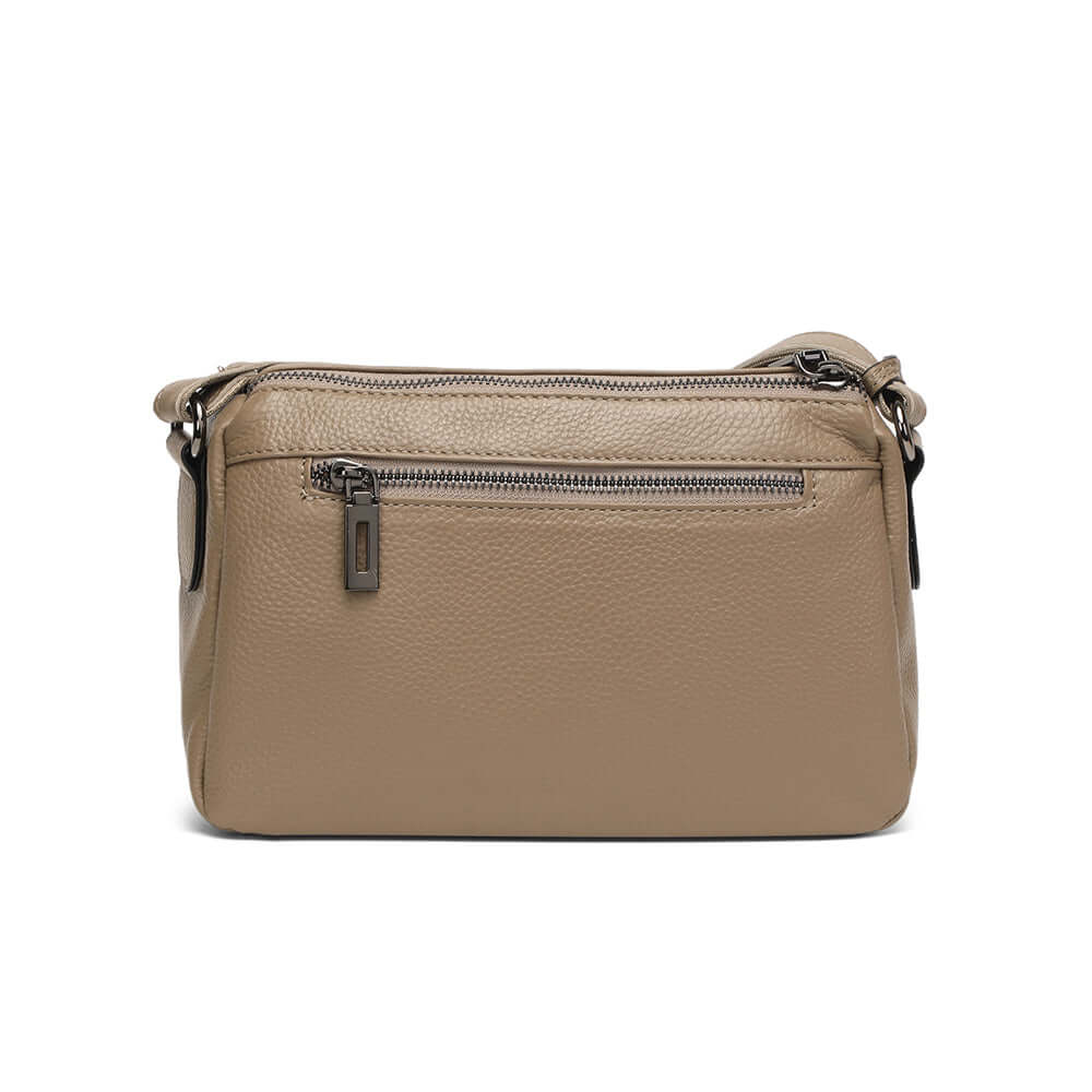 Back view with zip pocket of women’s leather crossbody bag