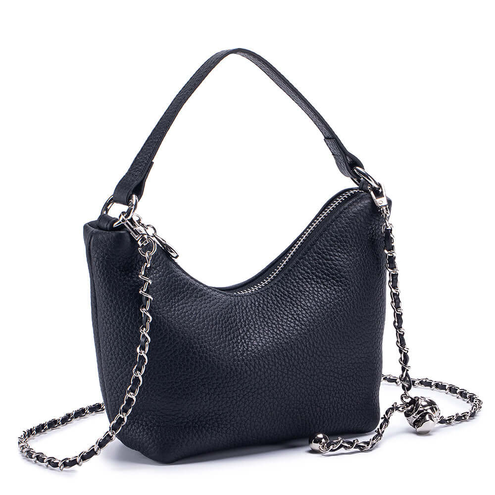 Angled view of black leather crossbody bag