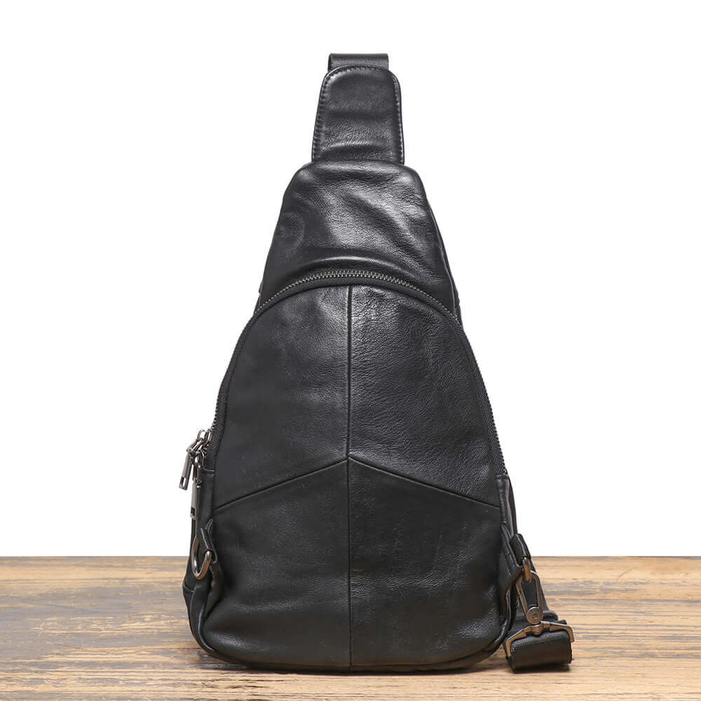 back view of black leather crossbody chest bag