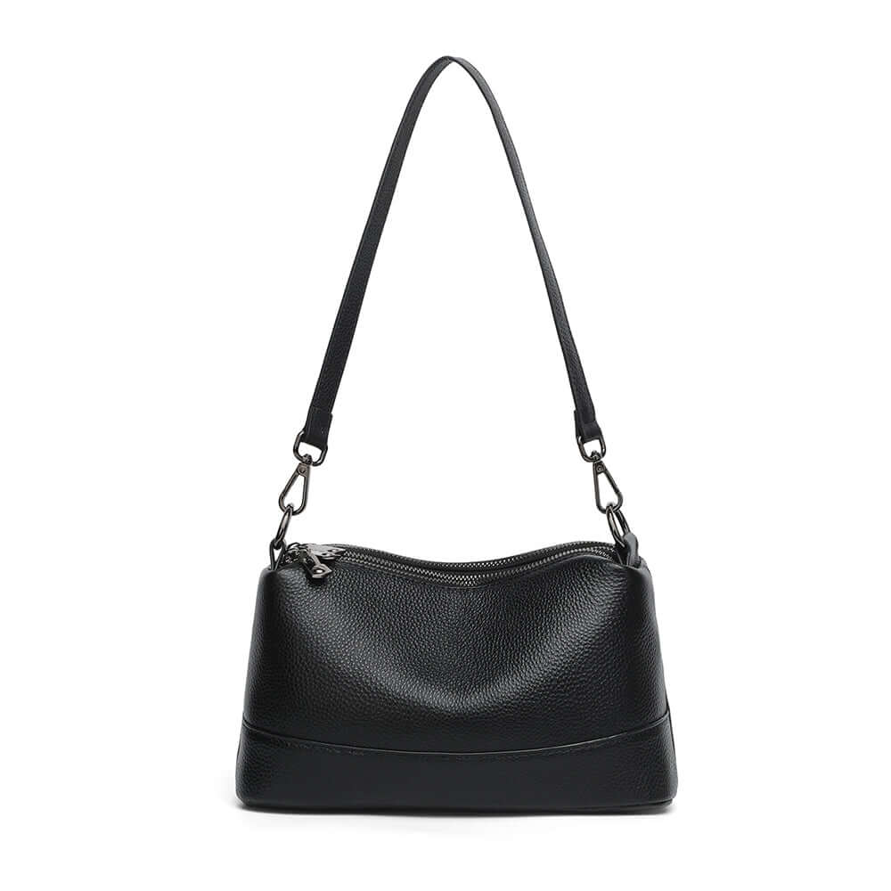 Black leather bag with short hand strap.