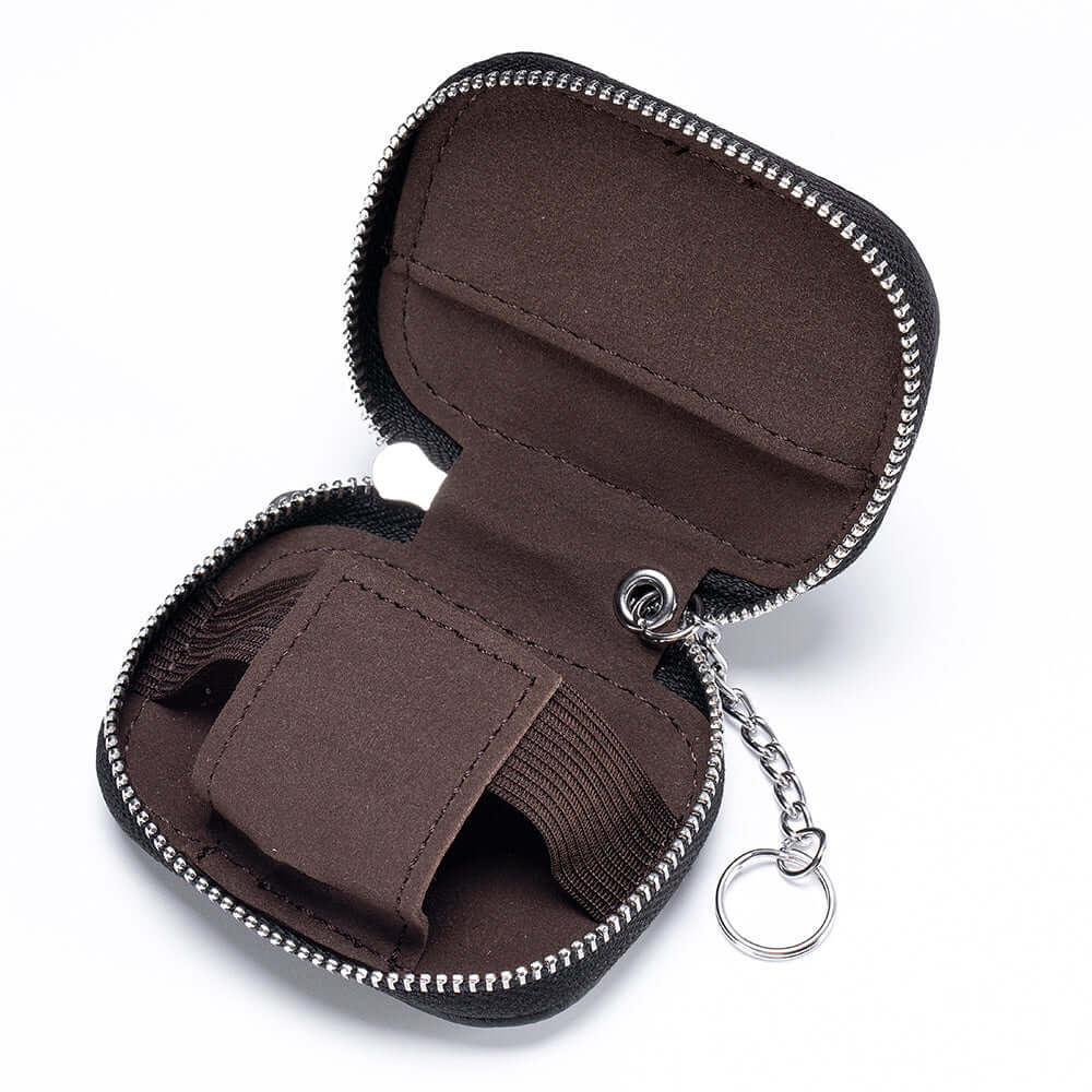 Open view of the leather earbud case.