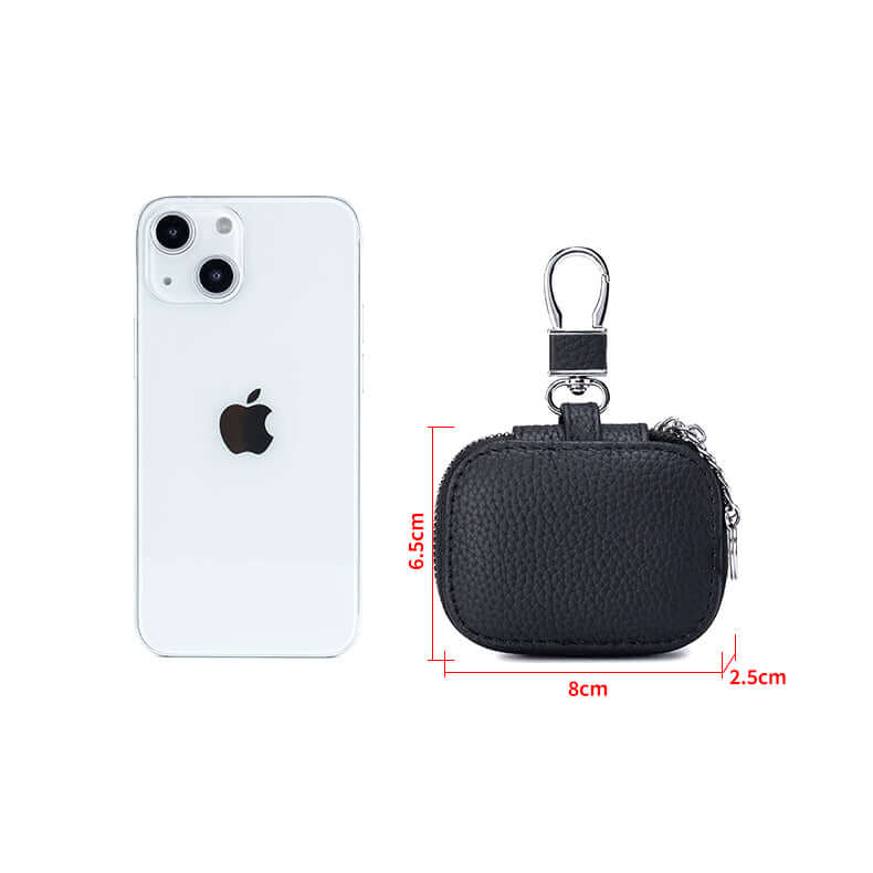 Black earbud case with measurements next to an iPhone on a white background.