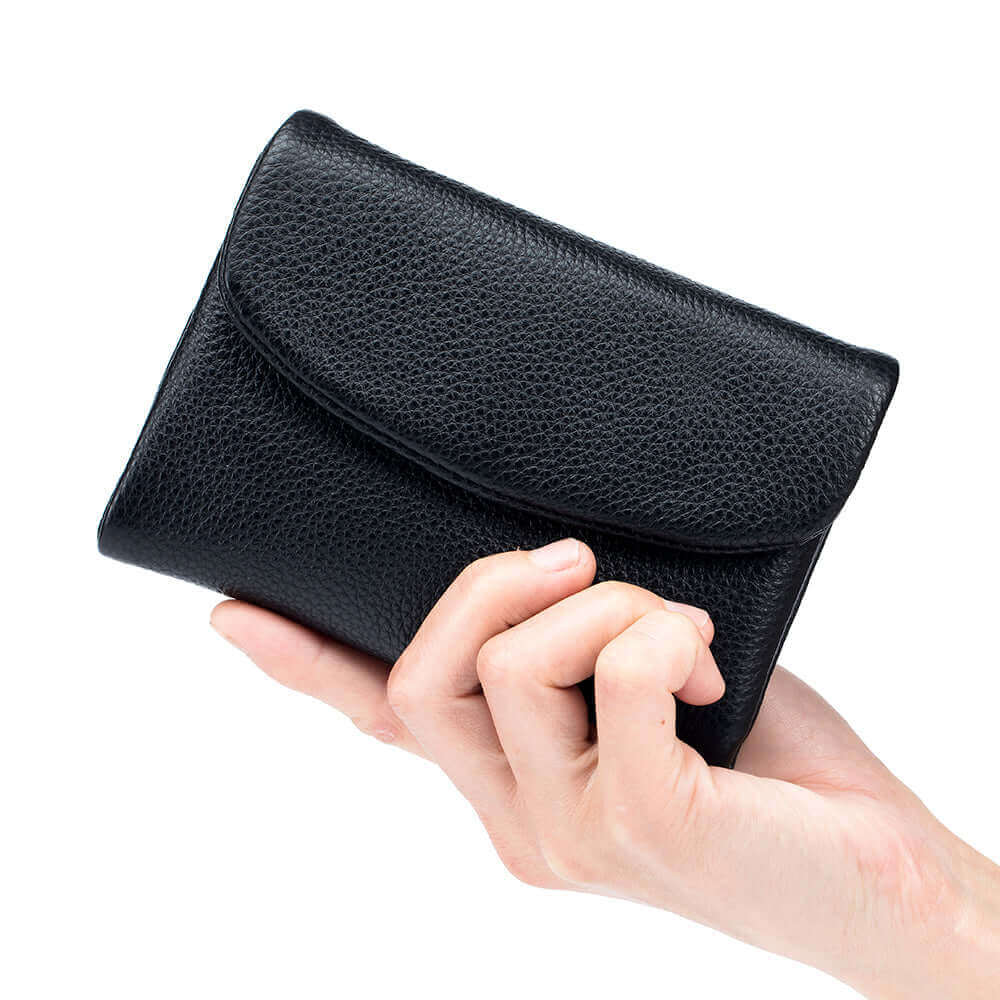 Closed black leather envelope wallet, compact and stylish.