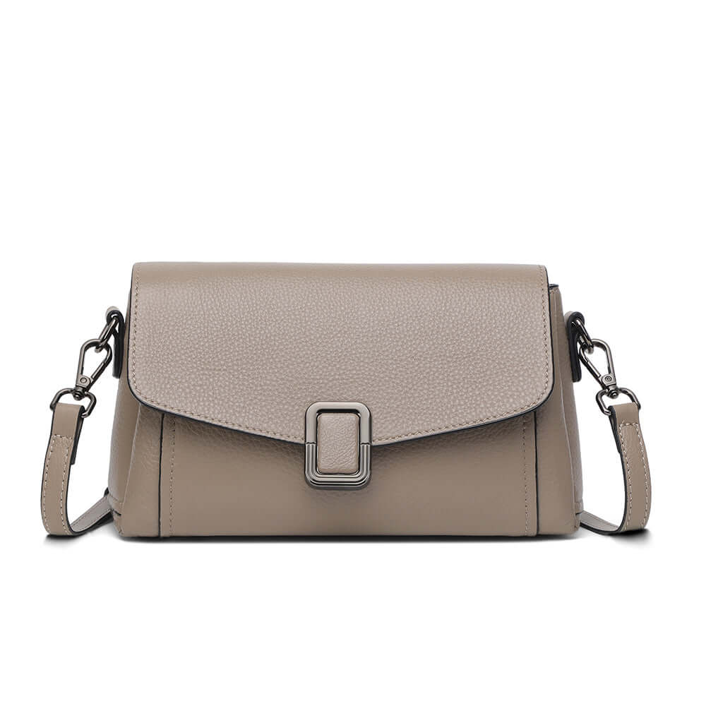Front view of leather flap shoulder bag with magnetic closure