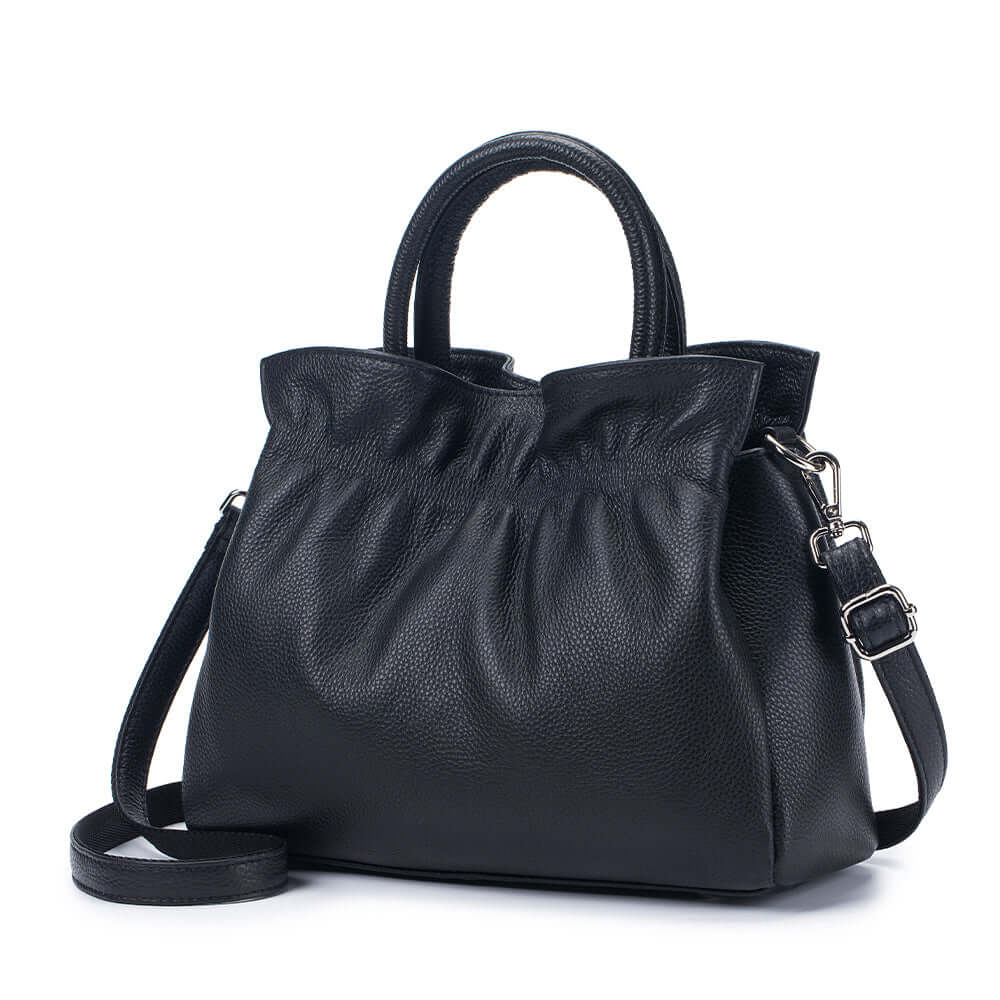 Black leather handbag front view with pleated design