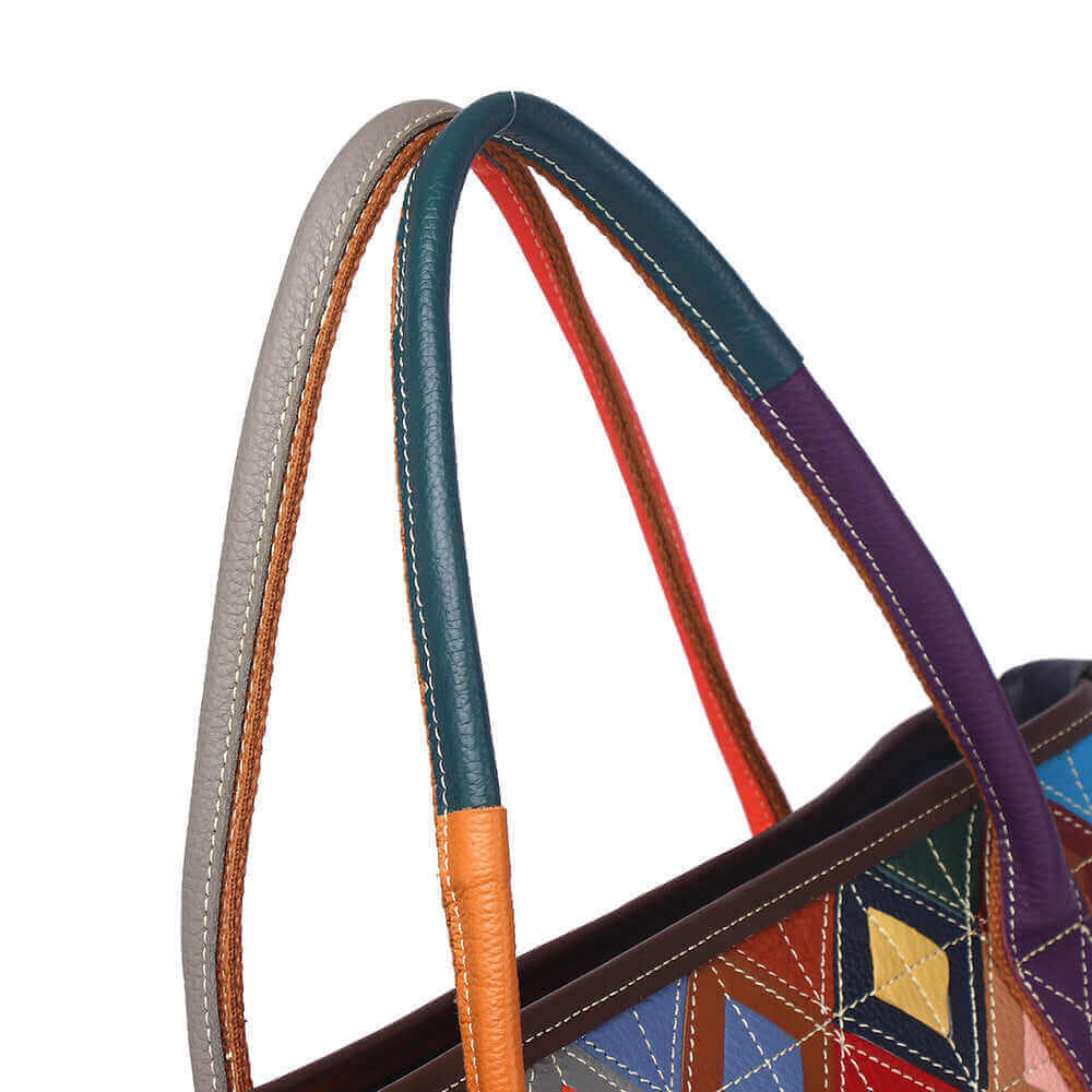 Close-up of vibrant leather patchwork design on the handbag.