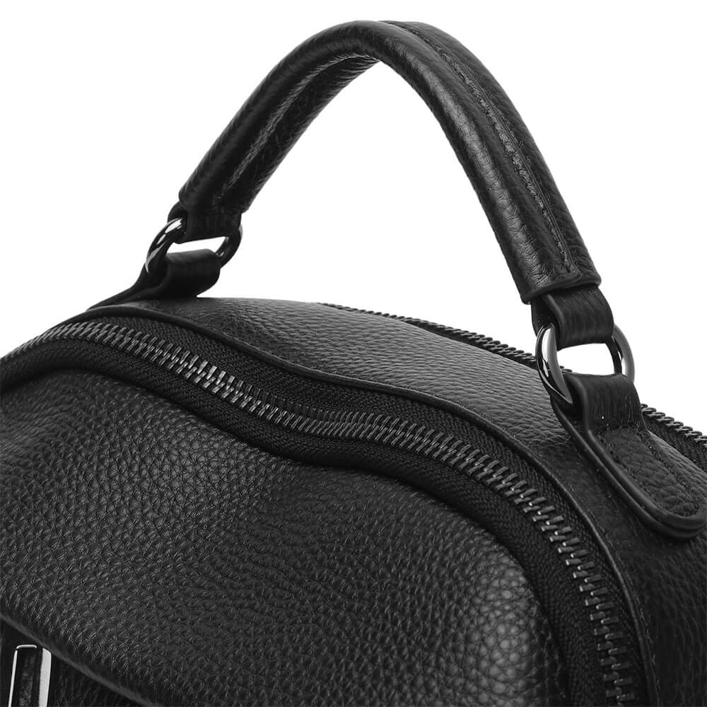 Closeup of top handle and hardware detail