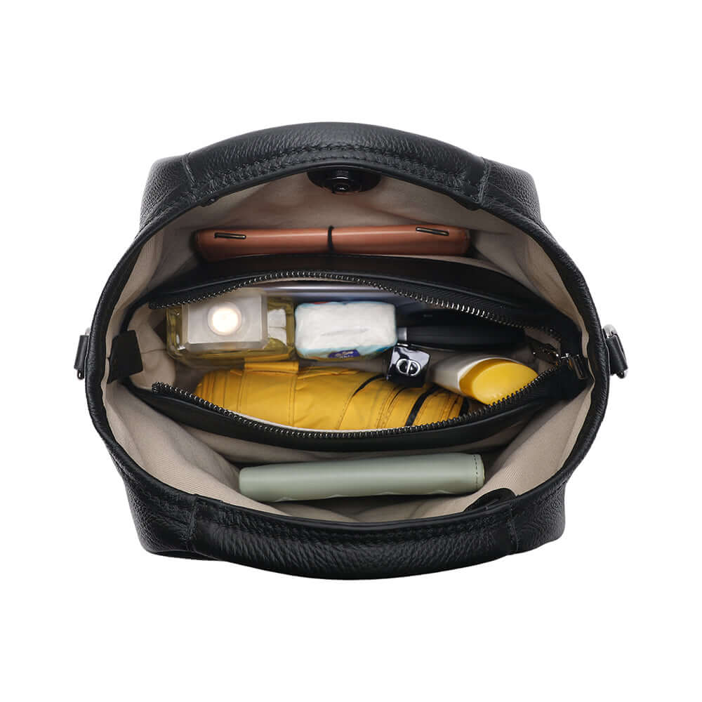 Inner pockets and compartments of leather handbag