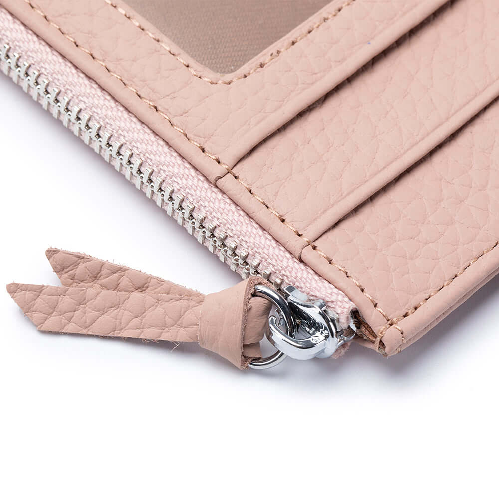Close-up of zipper pocket on leather lanyard wallet