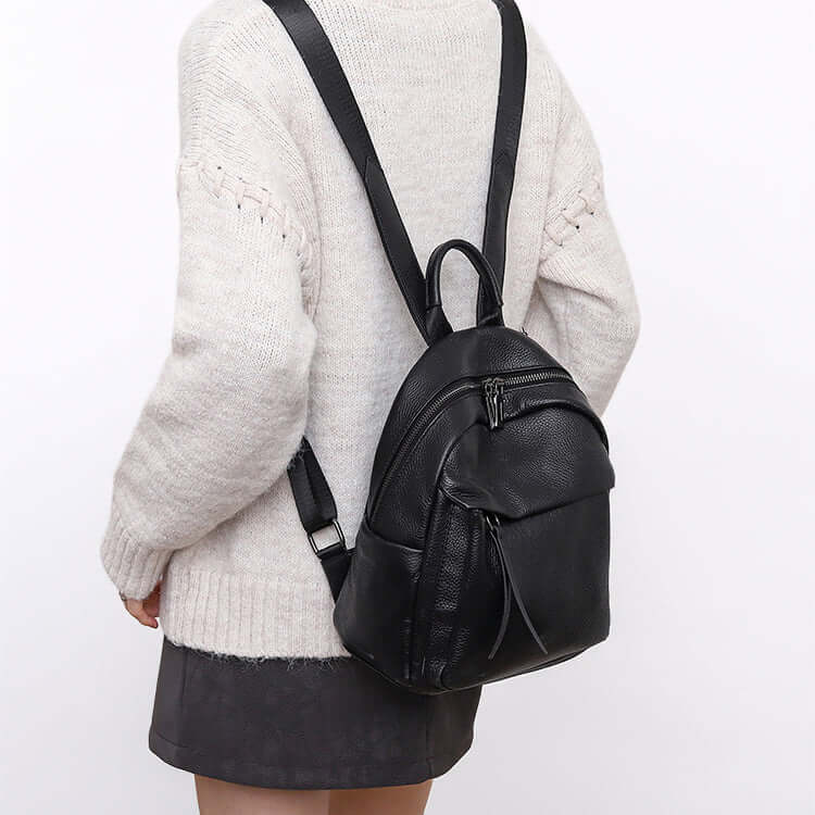 Person wearing a black backpack