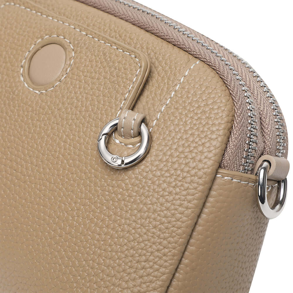 Leather mini crossbody bag details.