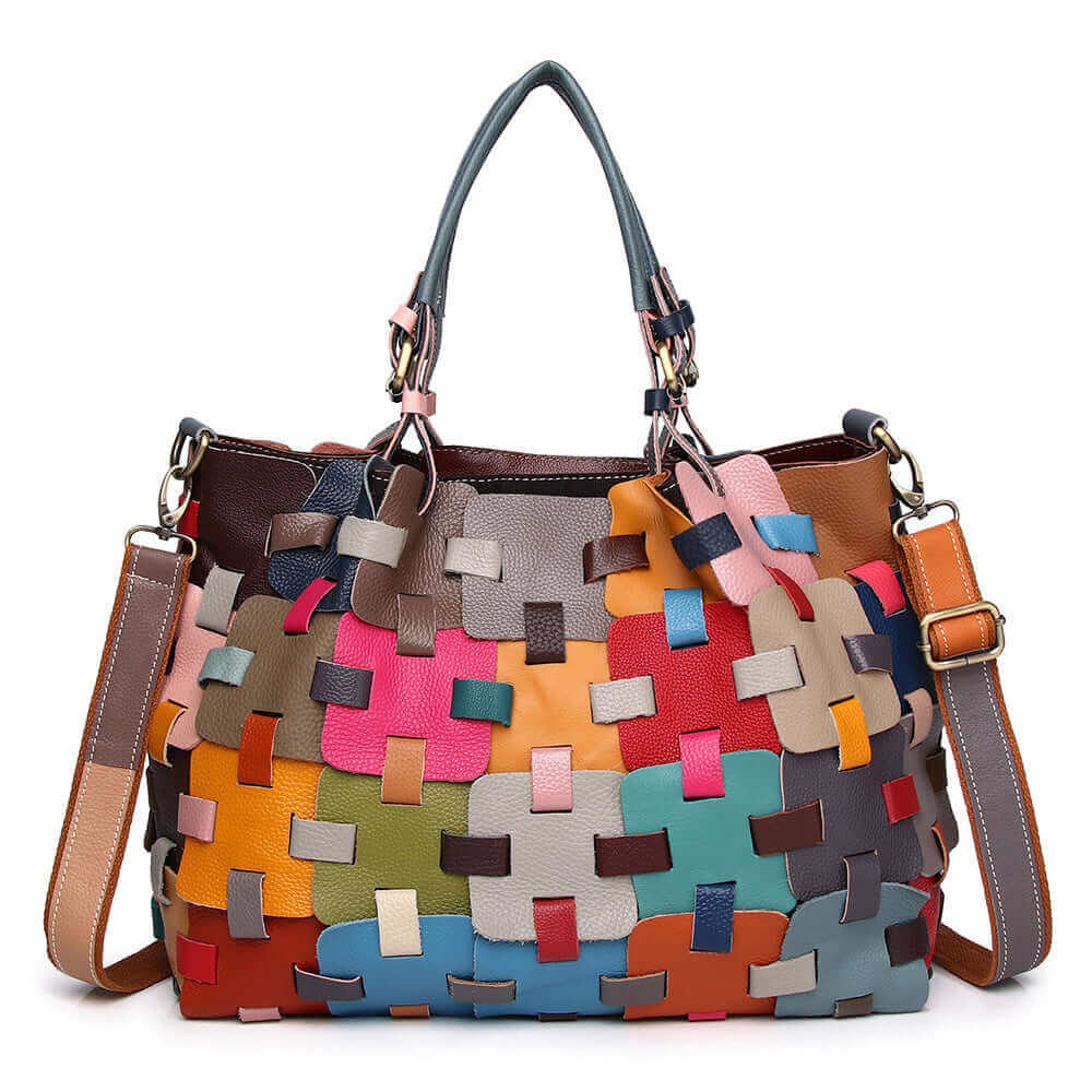 Front view of unique leather patchwork handbag with colorful design.