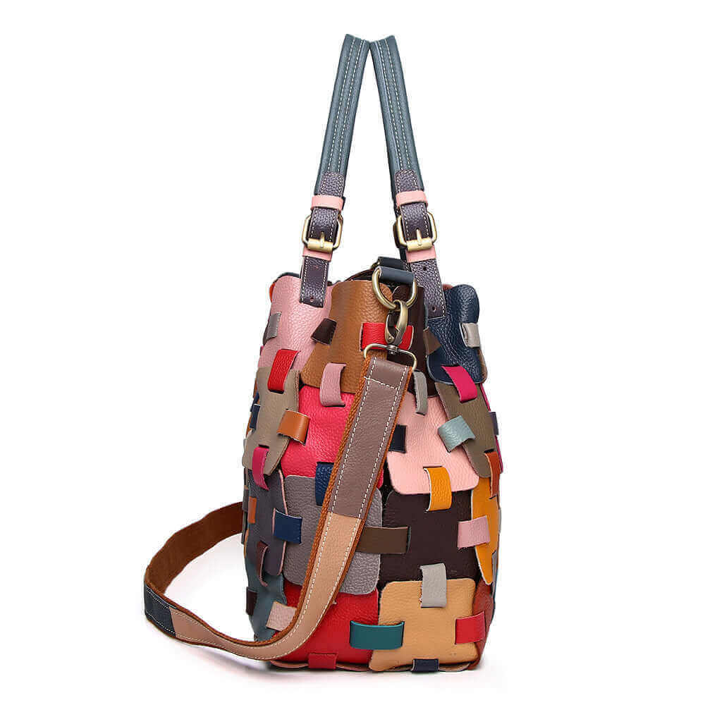 Side view of genuine leather handbag showcasing vibrant patchwork details.