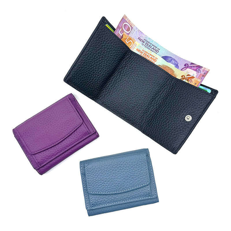 Leather RFID mini wallet for women in blue, offering compact storage for cards, cash, and coins.