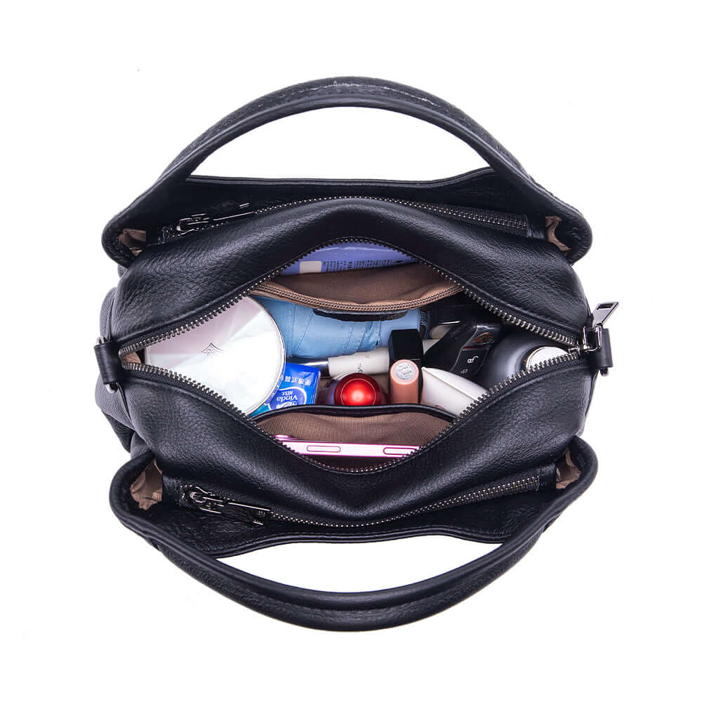  leather shoulder bag filled with daily essentials