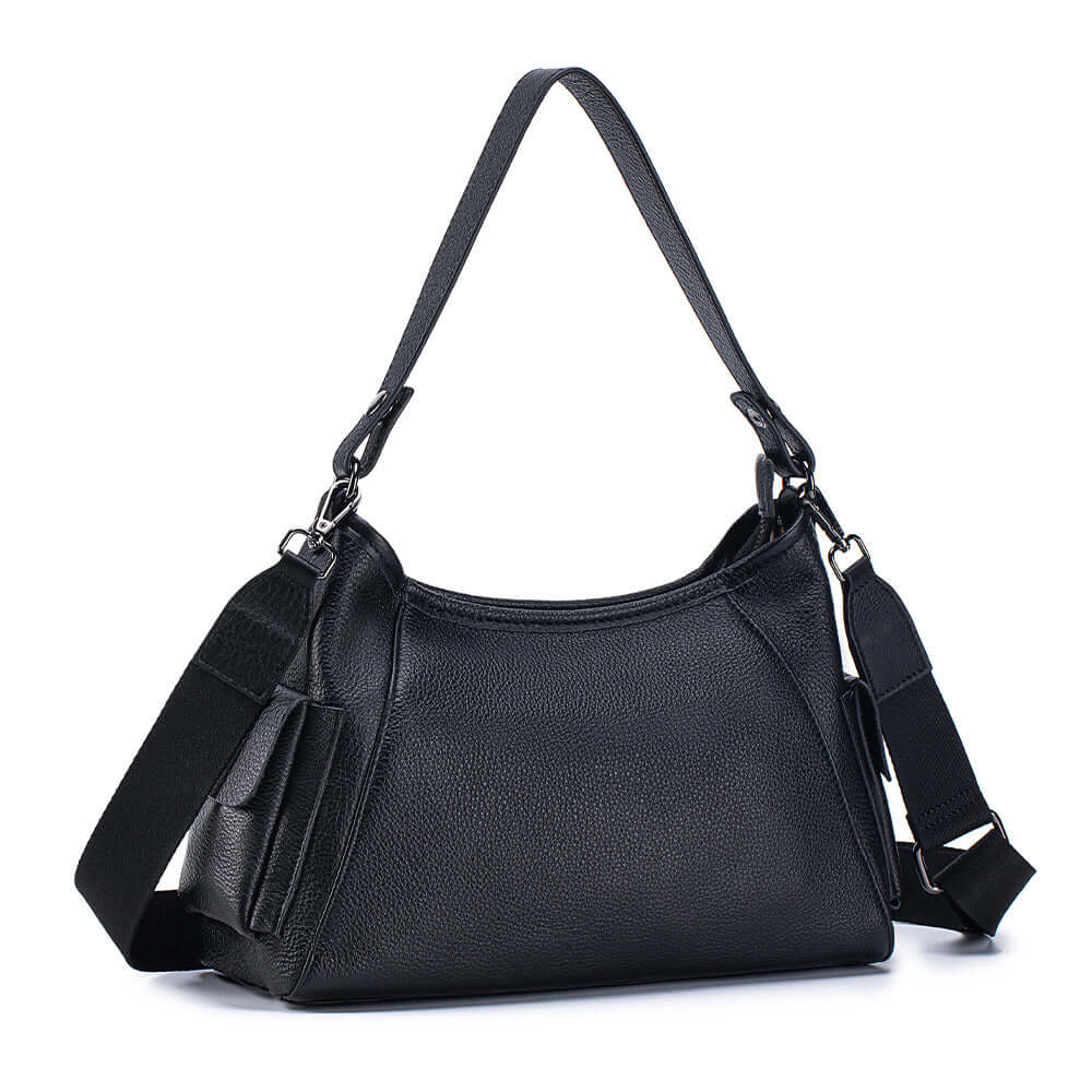 Leather shoulder bag styled with casual black outfit.