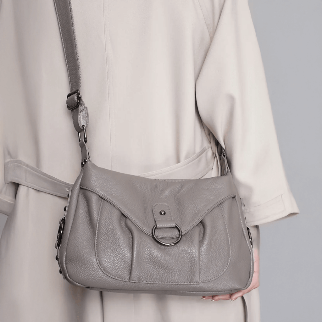 Model wearing the leather bag as a crossbody