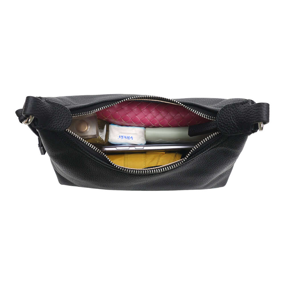 Handbag holding daily essentials inside