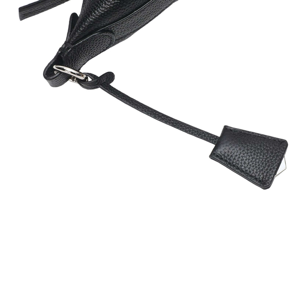 Leather shoulder bag styled on display table