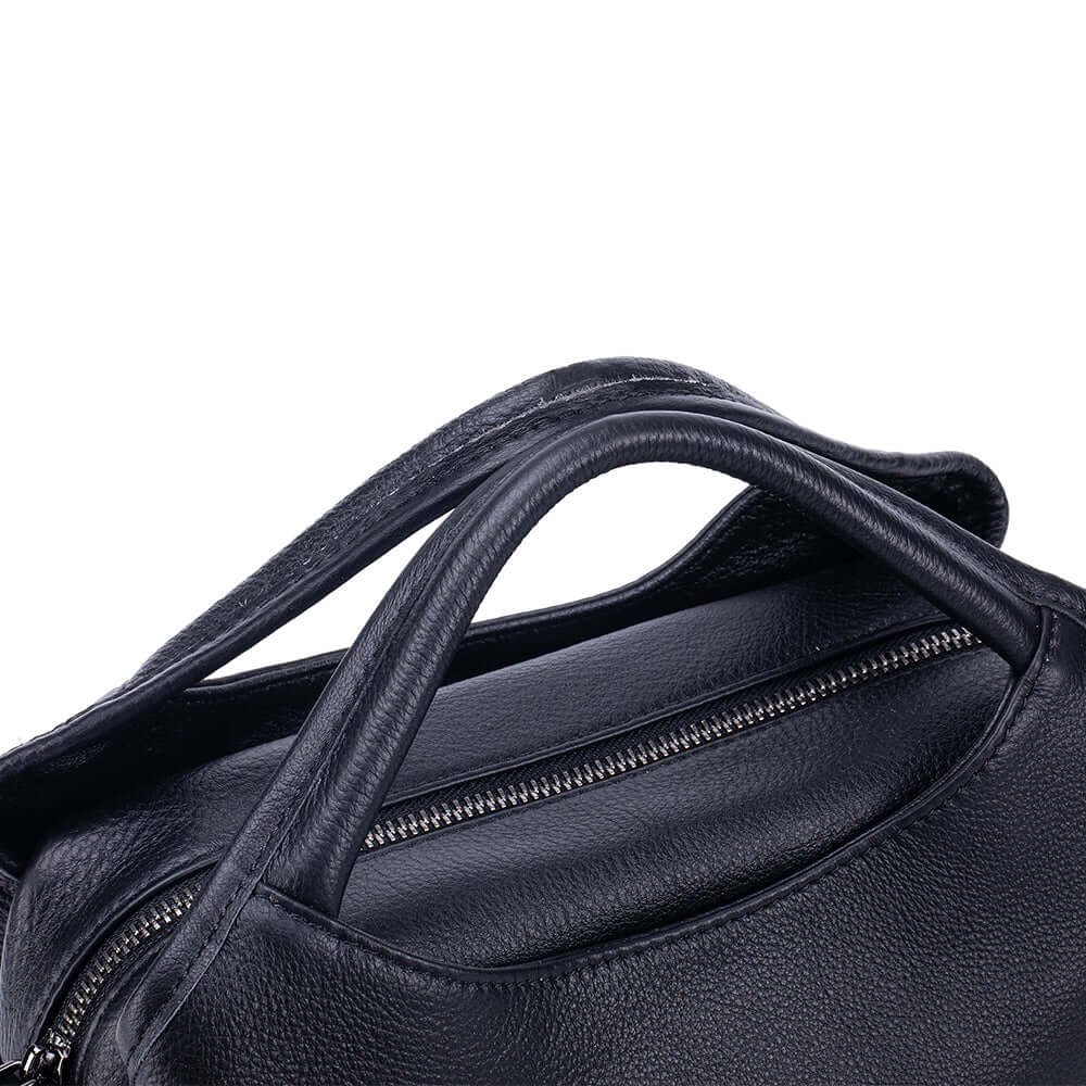 close-up of leather top handles