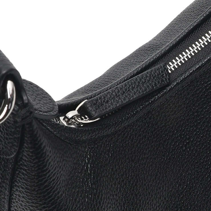 Top zipper design of leather handbag