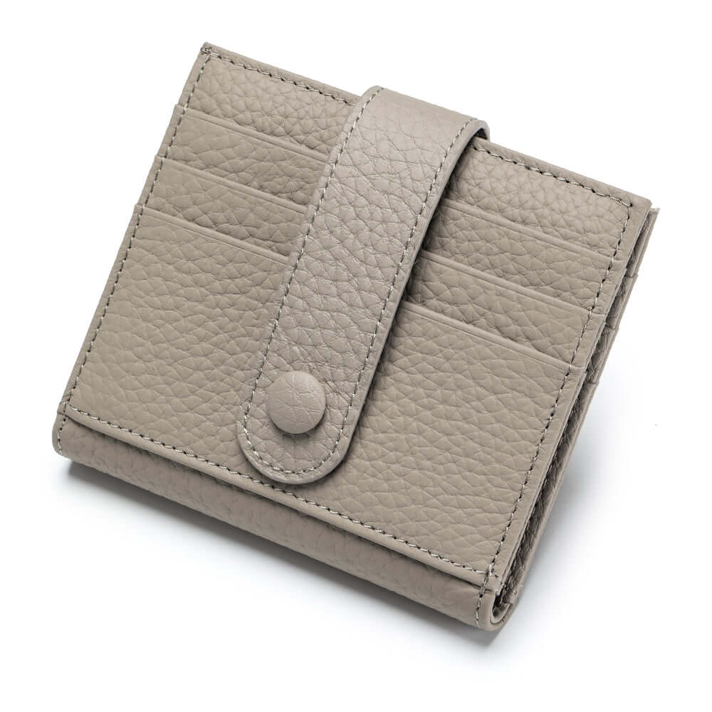 Grey slim leather wallet displayed with cards and cash