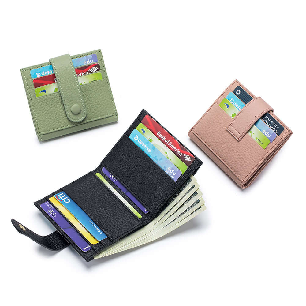 Multi-colour slim leather wallets in black, green, pink.