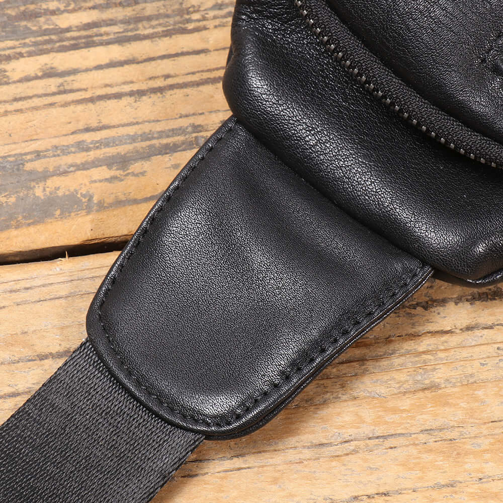 closeup of genuine leather texture on black sling bag