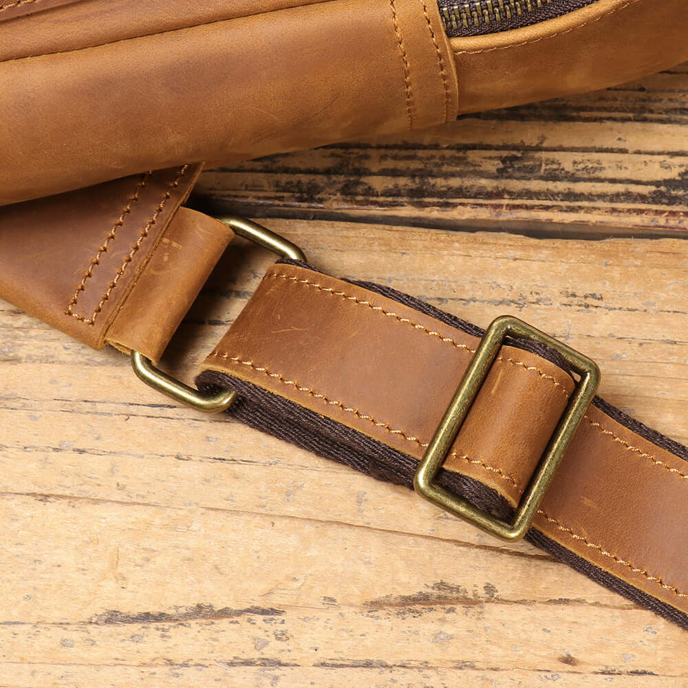 adjustable strap detail leather sling bag