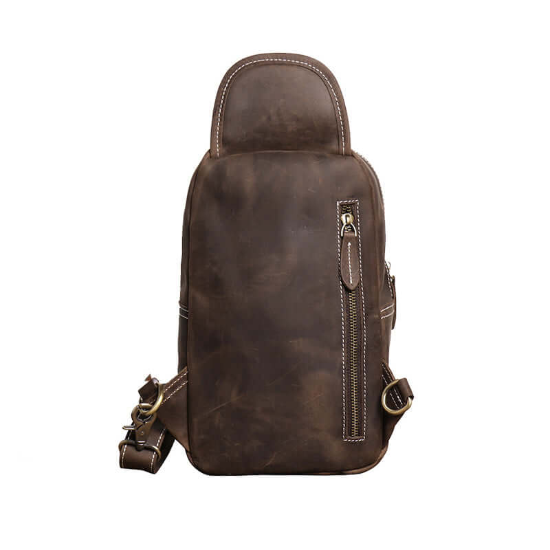 Back view of the men’s vintage leather sling bag with rear zipper pocket and adjustable strap.