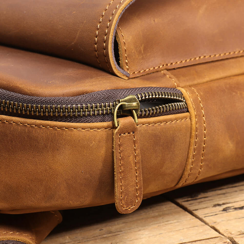 vintage metal zipper on leather crossbody bag