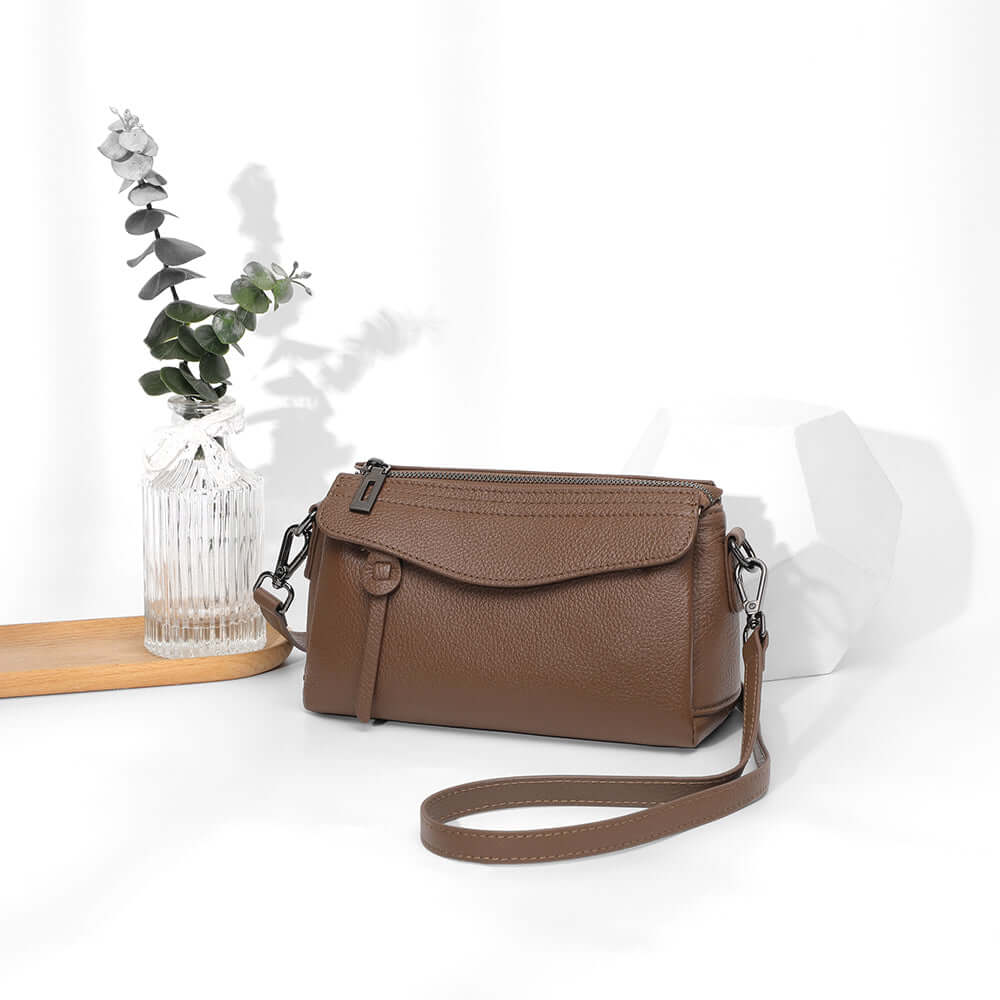 lose-up leather texture and stitching details of shoulder bag