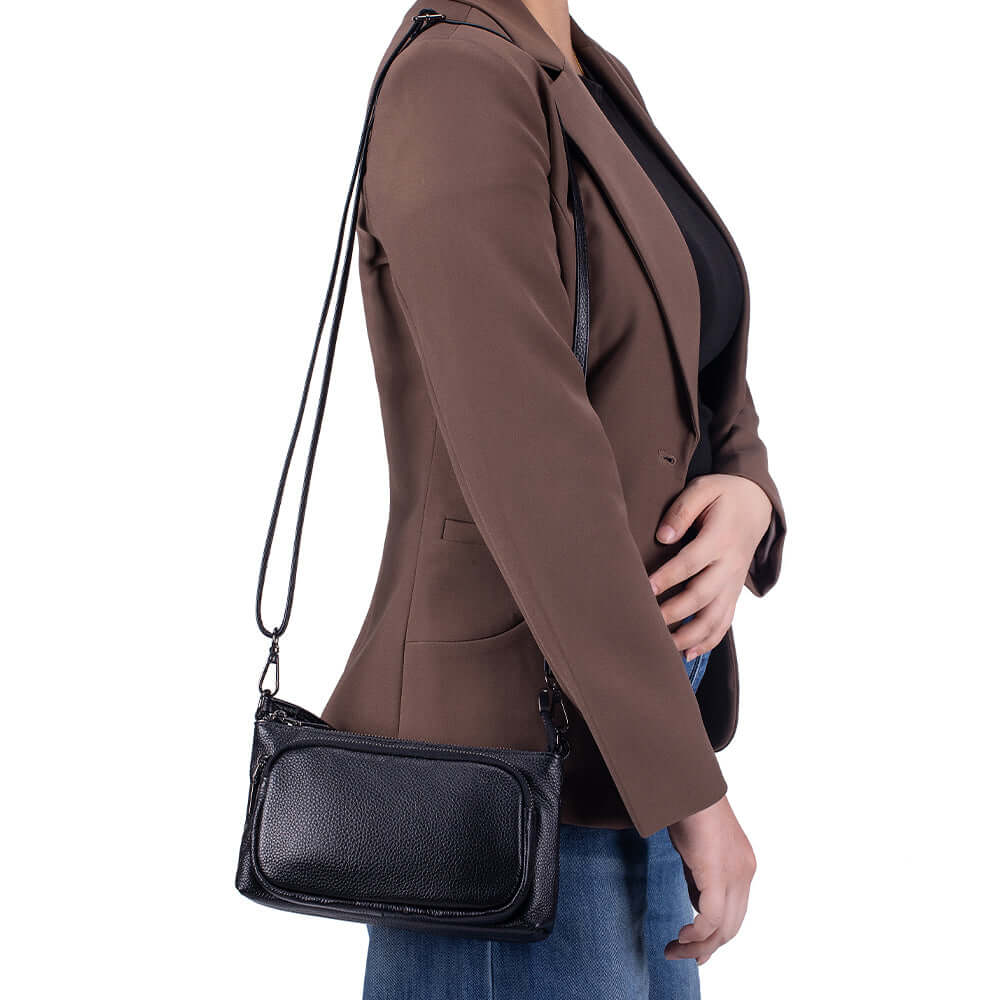 Leather small crossbody bag worn crossbody