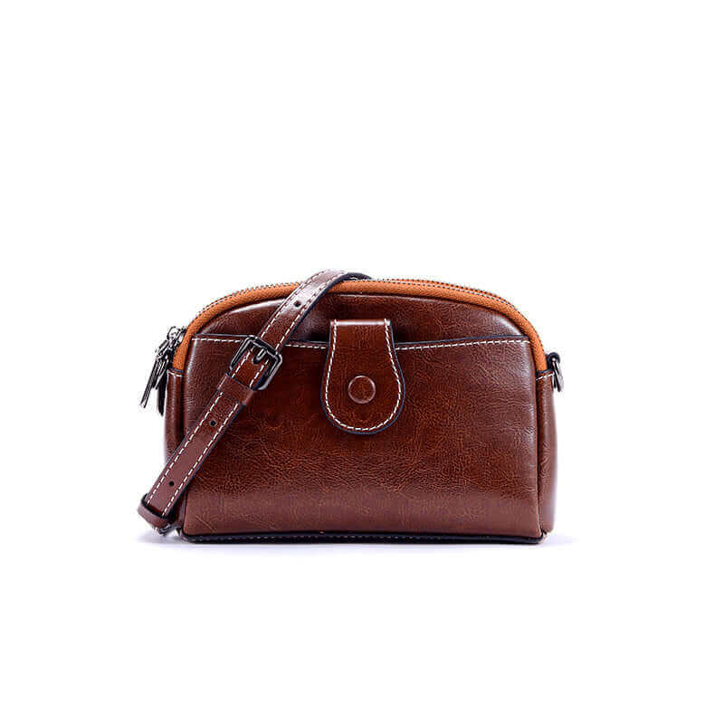 Front view of leather small shoulder crossbody bag in coffee brown