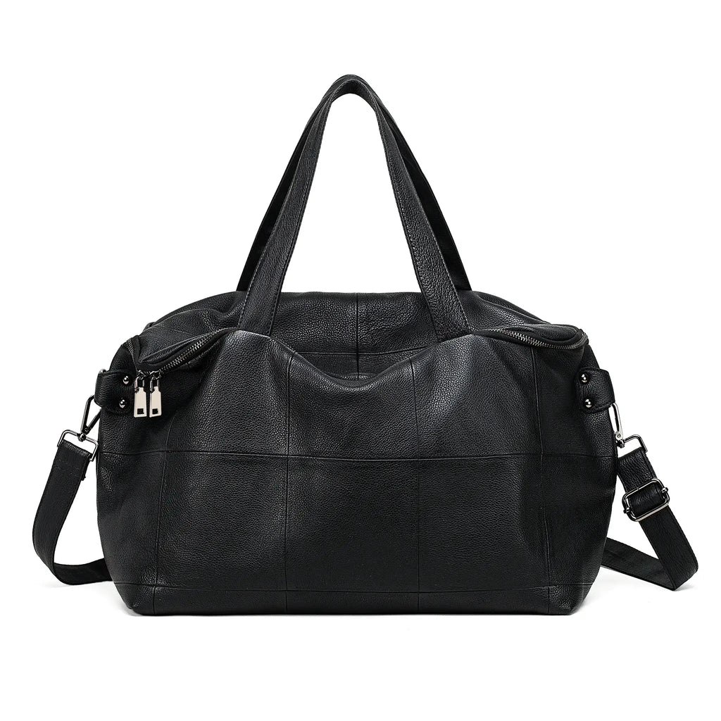 Front view of large leather tote bag with handles
