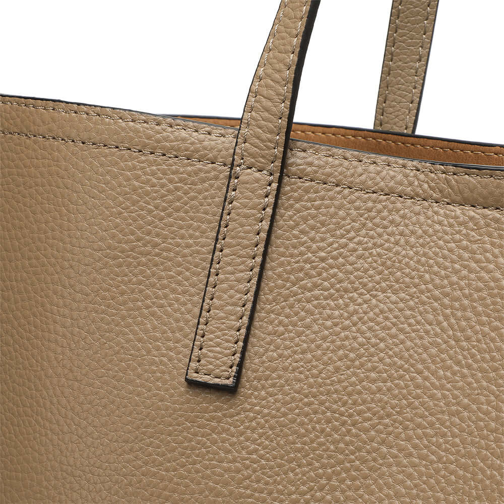 Stitching detail on leather tote