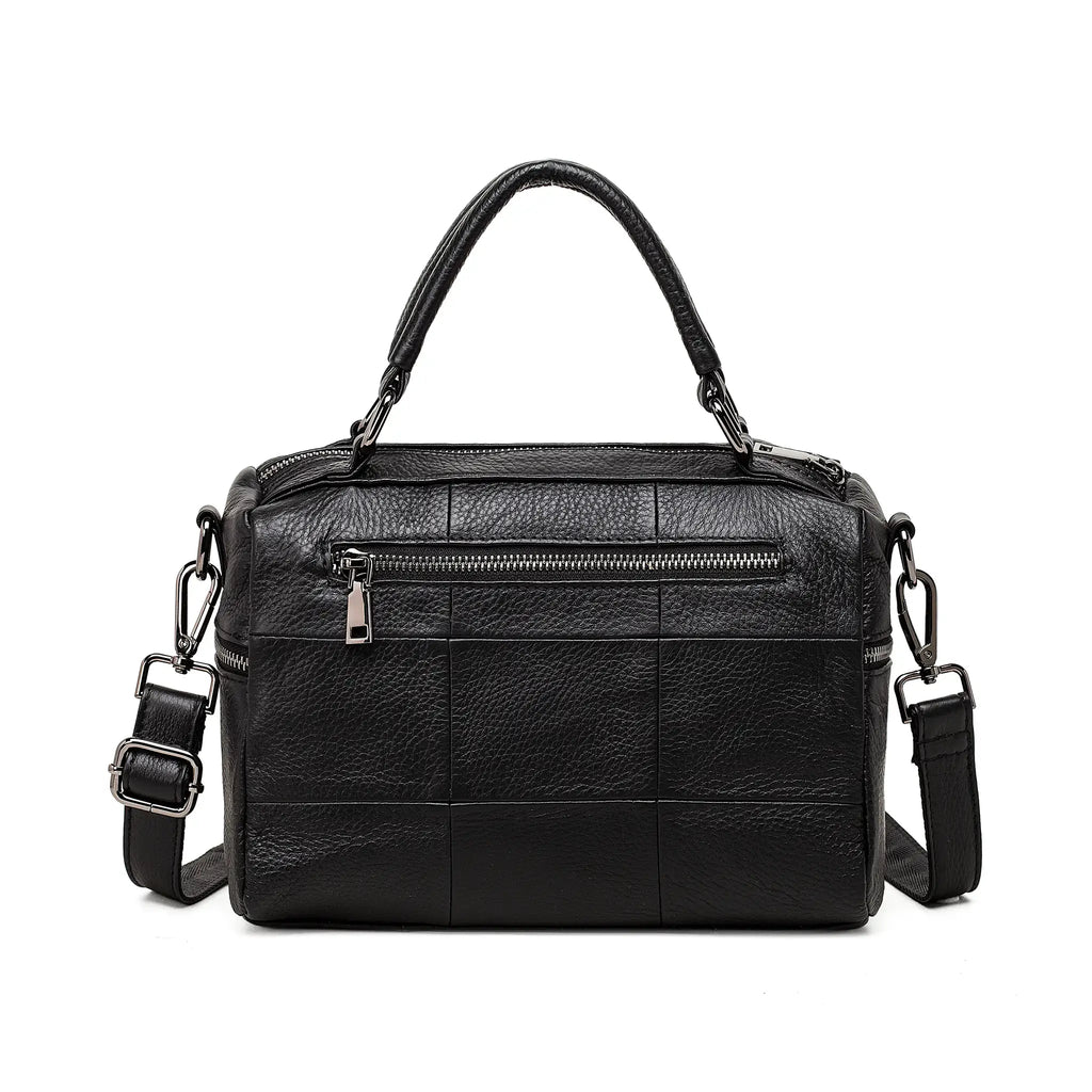 Lightweight and compact black leather bag perfect for daily essentials.