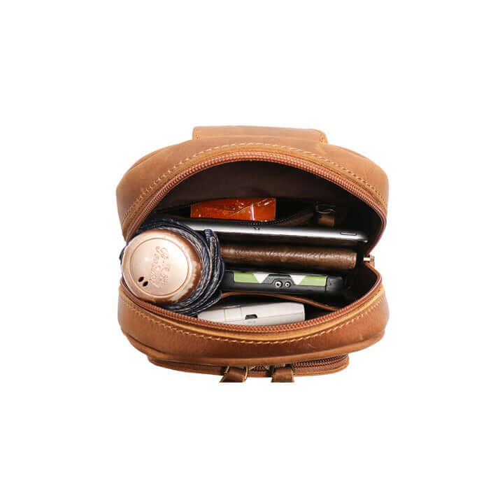 Brown leather case with electronic devices inside