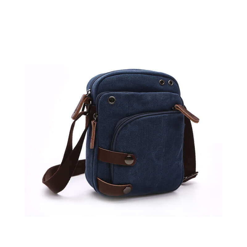 Durable blue men's canvas crossbody bag for everyday wear.